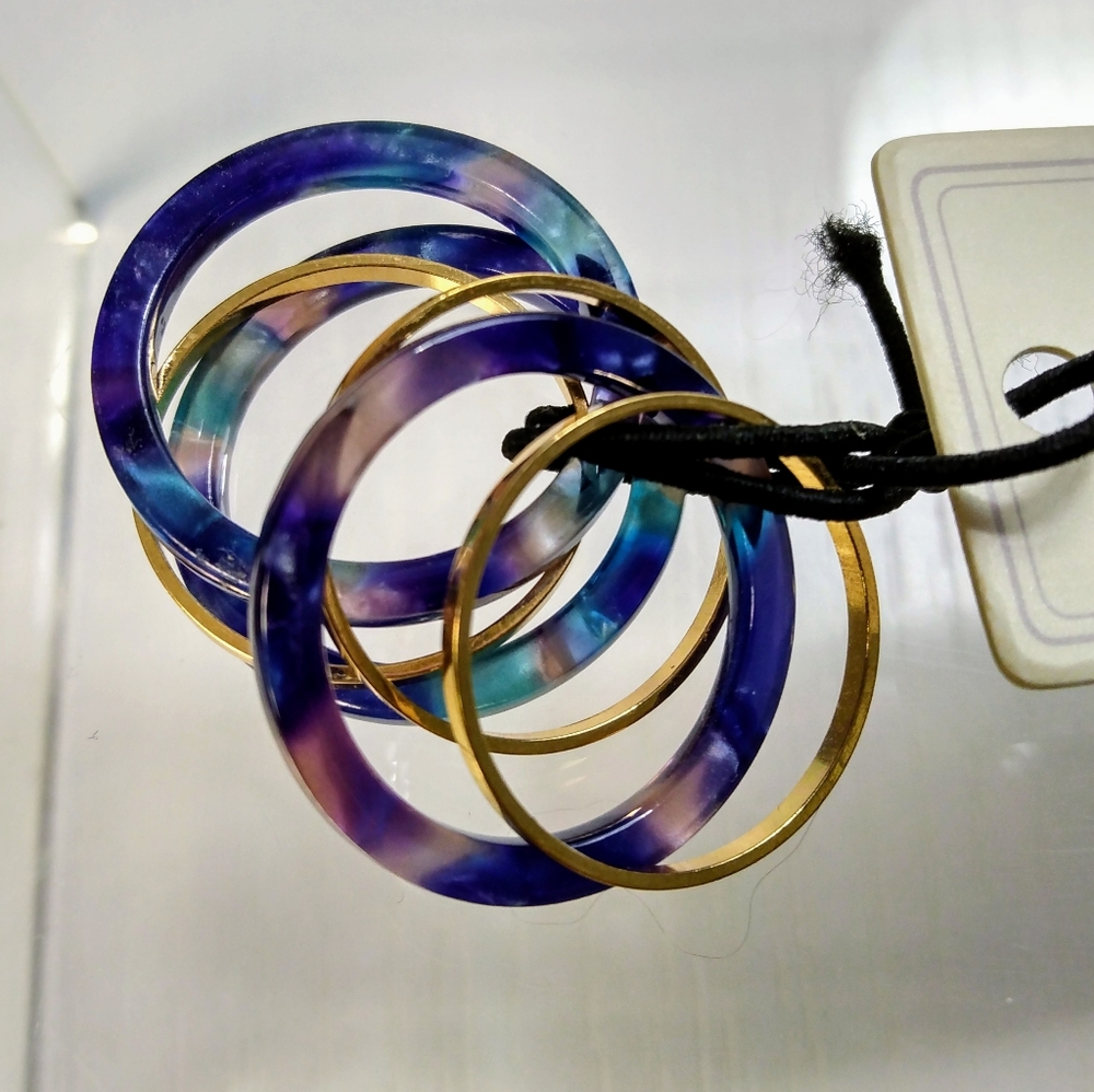 Rand Brothers resin and brass stack rings. Size M (8). NWT